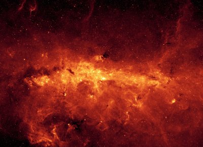 Zentrum der Milchstraßengalaxie, gesehen vom Spitzer-Weltraumteleskop. Infrarotbild des galaktischen Zentrums und staubiger Wolken, beleuchtet von jungen massiven Sternen. NASA. Wissenschaft Astronomie Raum von National Aeronautics and Space Administration National Aeronautics and Space Administration